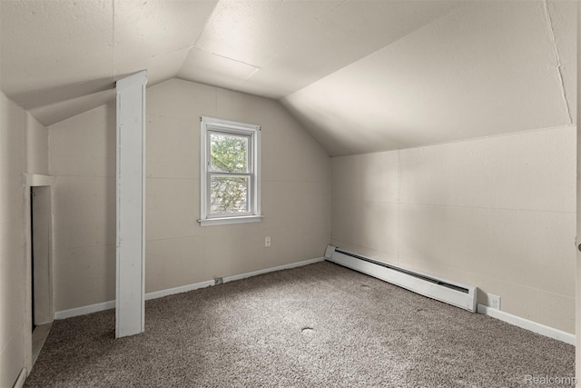 4933 Ziegler St, Dearborn Heights, MI 48125 - bonus room featuring a baseboard heating unit, lofted ceiling, and carpet floors
