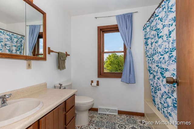 8651 22 Mile Rd NE, Sand Lake, MI 49343 - full bath featuring vanity and shower / bath combo with shower curtain