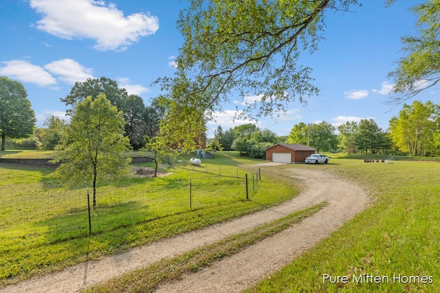 8651 22 Mile Rd NE, Sand Lake, MI 49343 - view of dirt / gravel driveway with a rural view