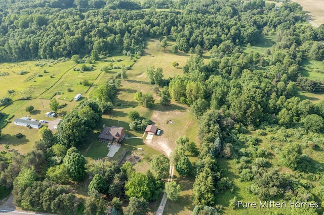8651 22 Mile Rd NE, Sand Lake, MI 49343 - view of property location featuring a heavily wooded area