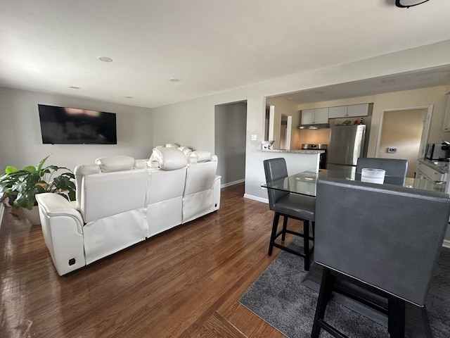 29635 Julius Blvd, Westland, MI 48186 - living area featuring dark wood-style floors and baseboards
