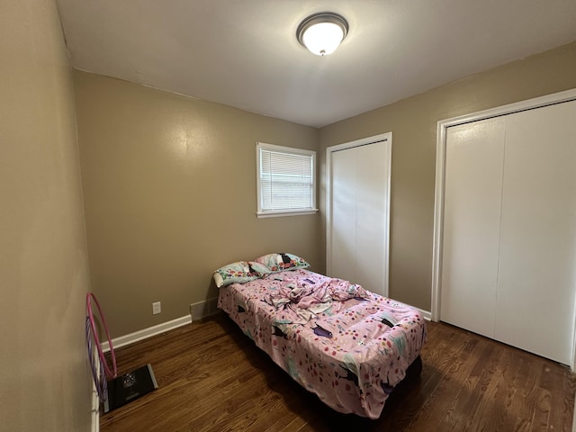 29635 Julius Blvd, Westland, MI 48186 - bedroom with multiple closets and wood finished floors