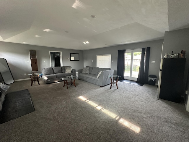 29635 Julius Blvd, Westland, MI 48186 - carpeted living area with lofted ceiling and baseboards