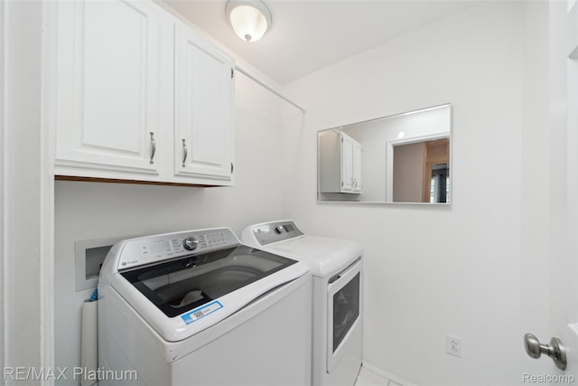 13368 N Fenton Rd, Fenton, MI 48430 - laundry area with separate washer and dryer and cabinet space