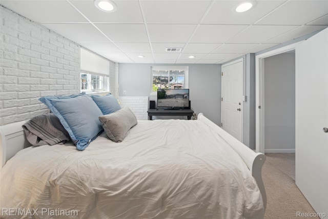 13368 N Fenton Rd, Fenton, MI 48430 - bedroom with carpet flooring, a drop ceiling, recessed lighting, and brick wall