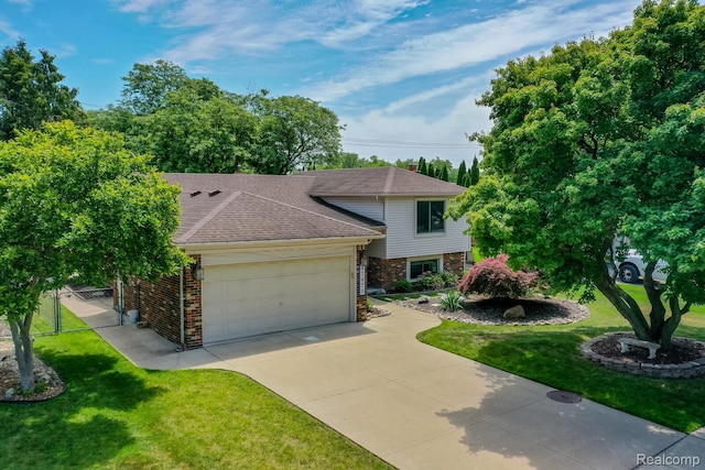 47470 Barbara Rd, Macomb, MI 48044 - tri-level home with an attached garage, brick siding, concrete driveway, and a shingled roof