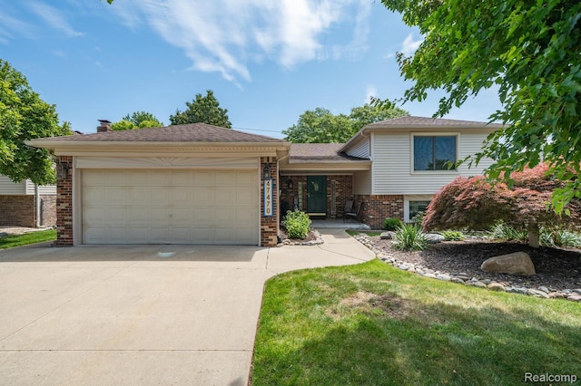 47470 Barbara Rd, Macomb, MI 48044 - tri-level home featuring brick siding, concrete driveway, a garage, a chimney, and a front lawn