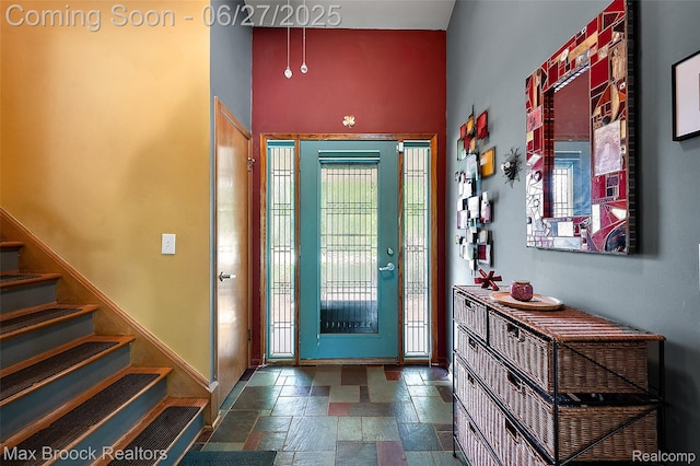 7189 Lindenmere Dr, Bloomfield Hills, MI 48301 - foyer with stone tile flooring and stairway