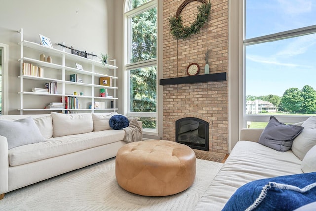 7639 Dunross Dr, Portage, MI 49024 - living room with a towering ceiling and a brick fireplace