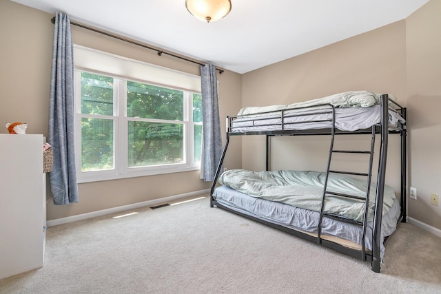 7639 Dunross Dr, Portage, MI 49024 - bedroom with carpet flooring and baseboards