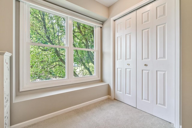 7639 Dunross Dr, Portage, MI 49024 - unfurnished bedroom featuring carpet flooring and a closet