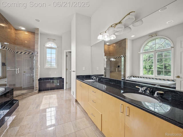 1539 Bartley Ln, Bloomfield Hills, MI 48304 - bathroom featuring a stall shower, double vanity, a garden tub, and recessed lighting