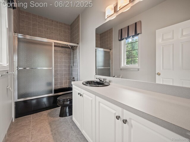 1539 Bartley Ln, Bloomfield Hills, MI 48304 - full bathroom with vanity, combined bath / shower with glass door, and tile patterned flooring