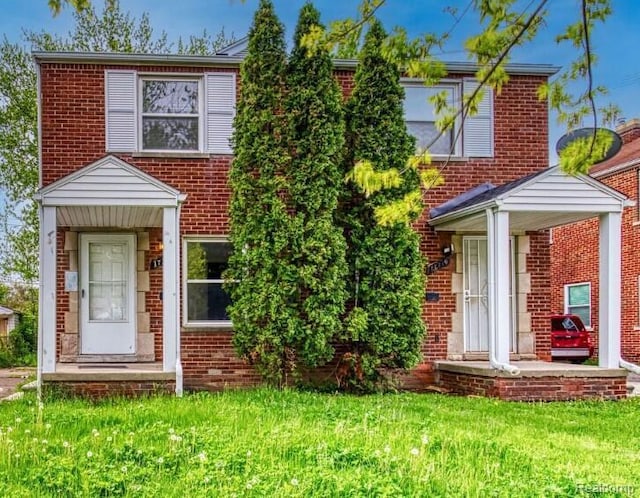 17710 Chester St, Detroit, MI 48224 - view of front of house with brick siding and a front yard