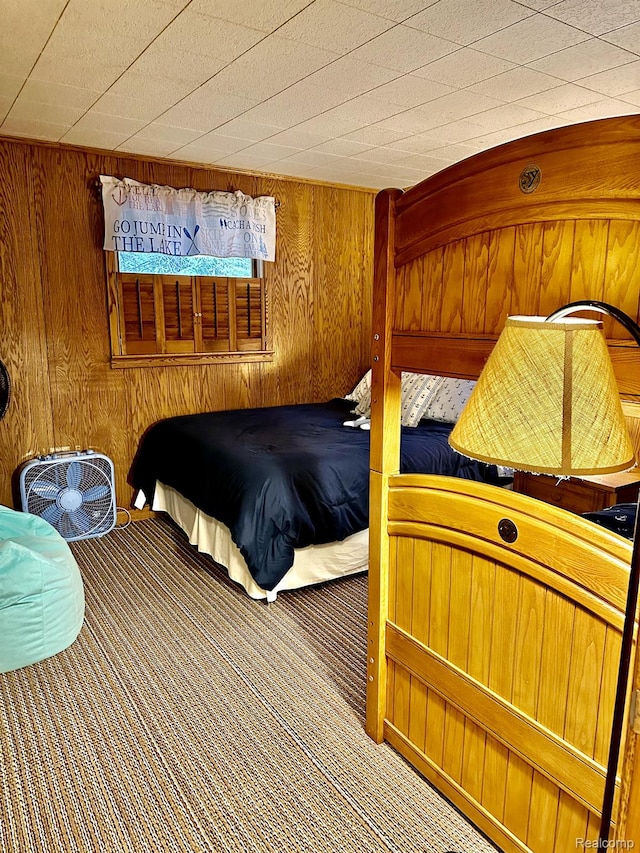 24579 US Highway 23 N, Ocqueoc, MI 49759 - carpeted bedroom featuring wooden walls