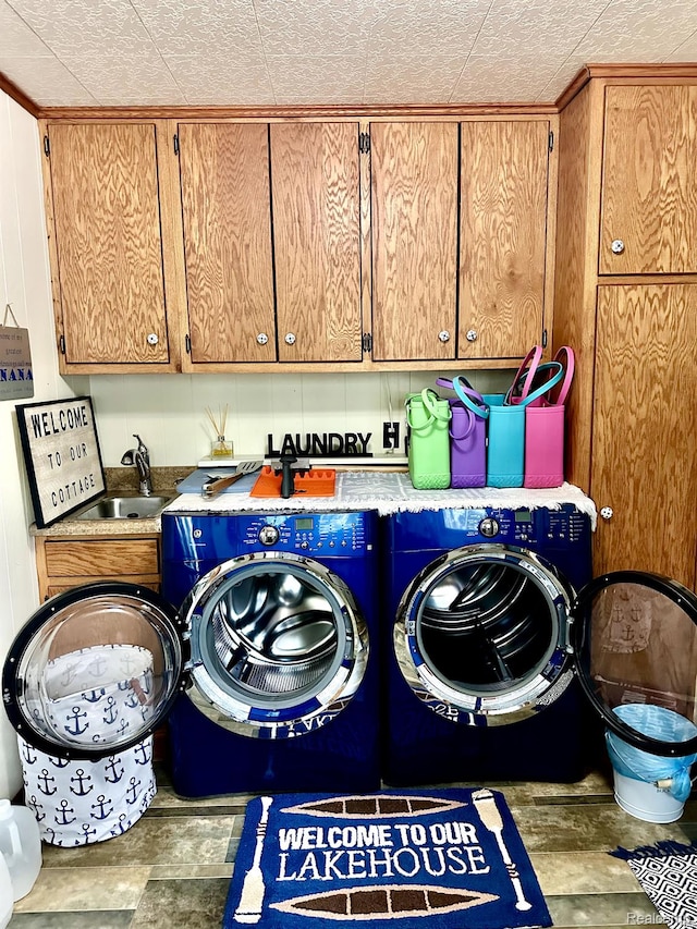 24579 US Highway 23 N, Ocqueoc, MI 49759 - laundry area with cabinet space and washing machine and clothes dryer