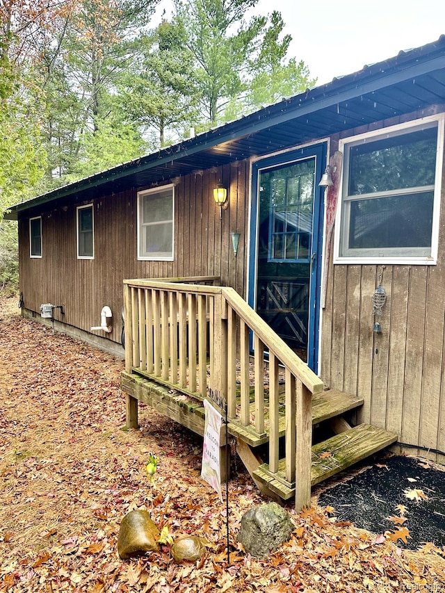 24579 US Highway 23 N, Ocqueoc, MI 49759 - doorway to property with a wooden deck