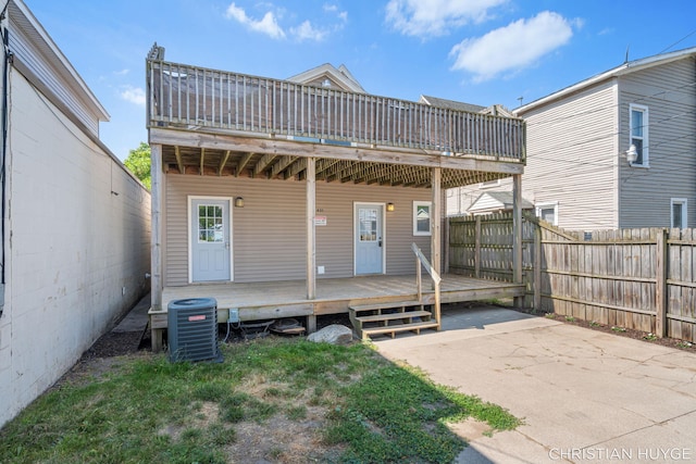 831 Bridge St NW, Grand Rapids, MI 49504 - rear view of property featuring a deck