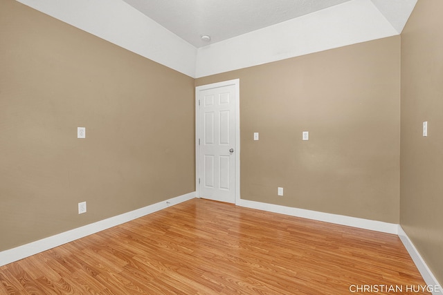 831 Bridge St NW, Grand Rapids, MI 49504 - spare room with light wood-style flooring and a smoke detector