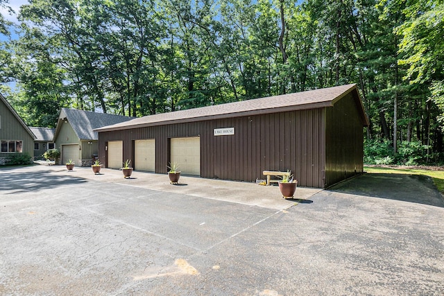 5254 Morrison St, Newaygo, MI 49337 - view of parking / parking lot with a detached garage