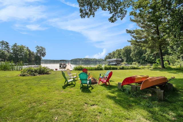 5254 Morrison St, Newaygo, MI 49337 - view of grassy yard with a water view and an outdoor fire pit