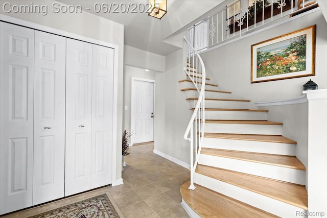 43603 Arlington Rd, Canton, MI 48187 - entrance foyer with stairway and tile patterned floors