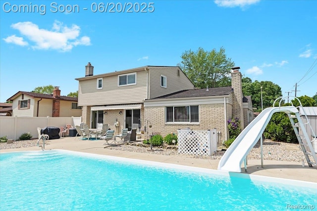 43603 Arlington Rd, Canton, MI 48187 - view of pool with a patio area and a water slide