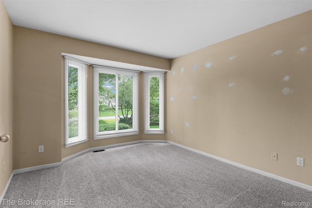 2048 Mayfair Dr, White Lake, MI 48383 - spare room featuring carpet floors