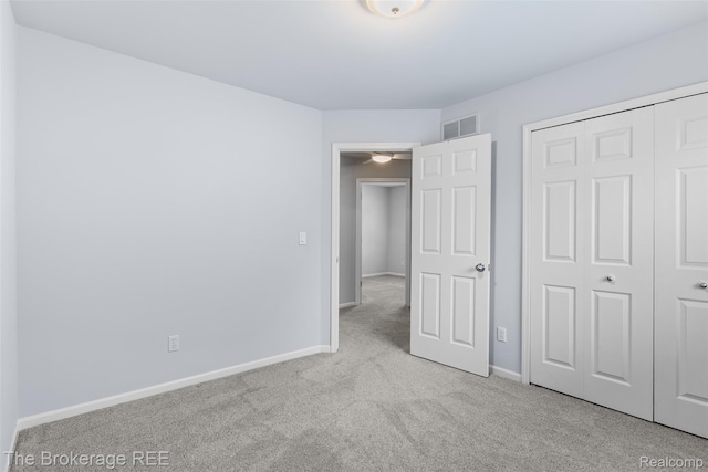 2048 Mayfair Dr, White Lake, MI 48383 - unfurnished bedroom with carpet and a closet