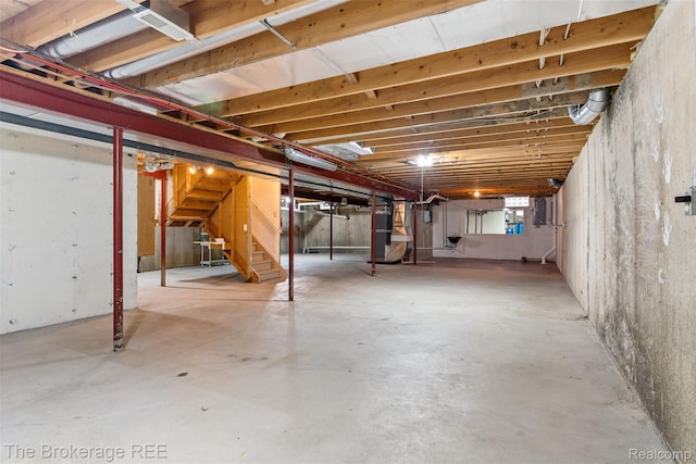 2048 Mayfair Dr, White Lake, MI 48383 - below grade area featuring stairs and electric panel