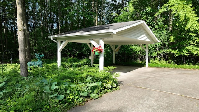 5724 E Townline Rd, Birch Run, MI 48415 - view of patio / terrace featuring concrete driveway and a carport
