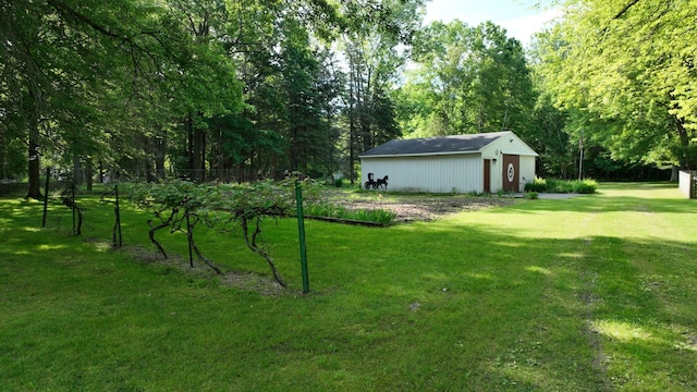5724 E Townline Rd, Birch Run, MI 48415 - view of grassy yard featuring an outdoor structure