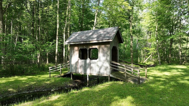 5724 E Townline Rd, Birch Run, MI 48415 - view of outbuilding featuring a wooded view