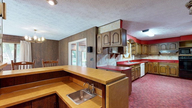 5724 E Townline Rd, Birch Run, MI 48415 - kitchen featuring black appliances, a textured ceiling, a chandelier, under cabinet range hood, and dark carpet