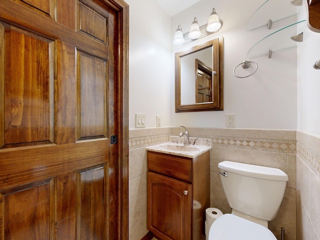 5724 E Townline Rd, Birch Run, MI 48415 - half bath with tile walls, vanity, and a wainscoted wall