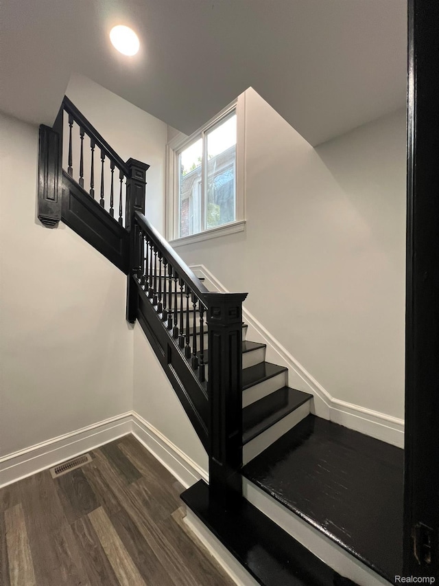 3431 Field St, Detroit, MI 48214 - stairs featuring baseboards and wood finished floors