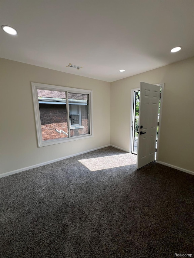 3431 Field St, Detroit, MI 48214 - empty room featuring dark carpet and recessed lighting