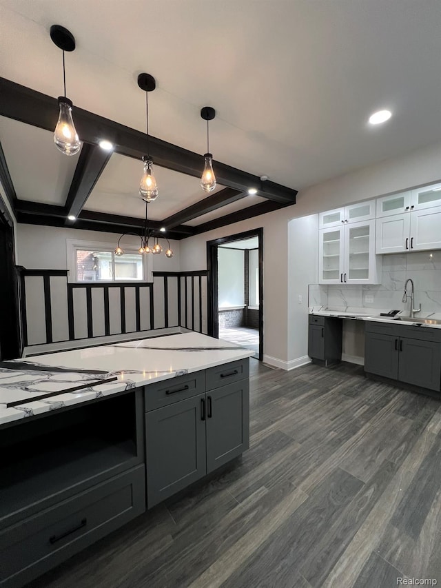 3431 Field St, Detroit, MI 48214 - kitchen with gray cabinets, dark wood-style flooring, backsplash, beamed ceiling, and glass insert cabinets