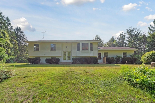 15730 Cedar Springs Ave NE, Cedar Springs, MI 49319 - view of front of property with french doors, a front yard, and entry steps