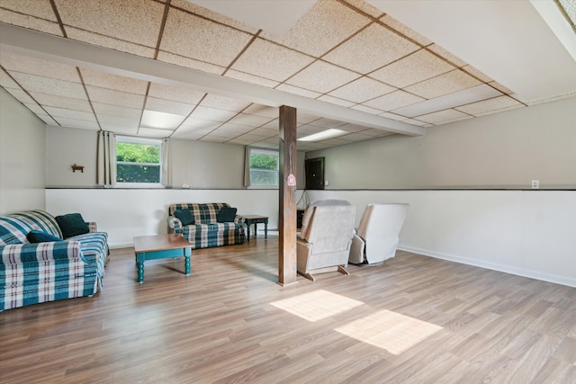 15730 Cedar Springs Ave NE, Cedar Springs, MI 49319 - living area with a paneled ceiling and wood finished floors