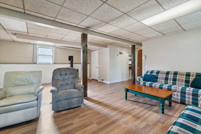 15730 Cedar Springs Ave NE, Cedar Springs, MI 49319 - living room featuring a drop ceiling and wood finished floors