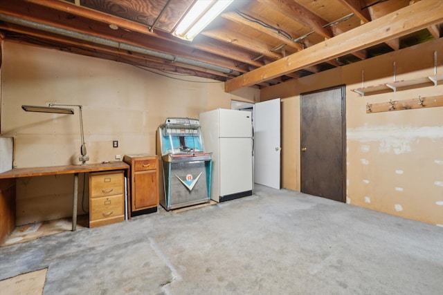 15730 Cedar Springs Ave NE, Cedar Springs, MI 49319 - unfinished basement with freestanding refrigerator