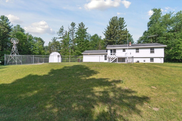 15730 Cedar Springs Ave NE, Cedar Springs, MI 49319 - fenced backyard with a storage shed, stairway, and view of scattered trees