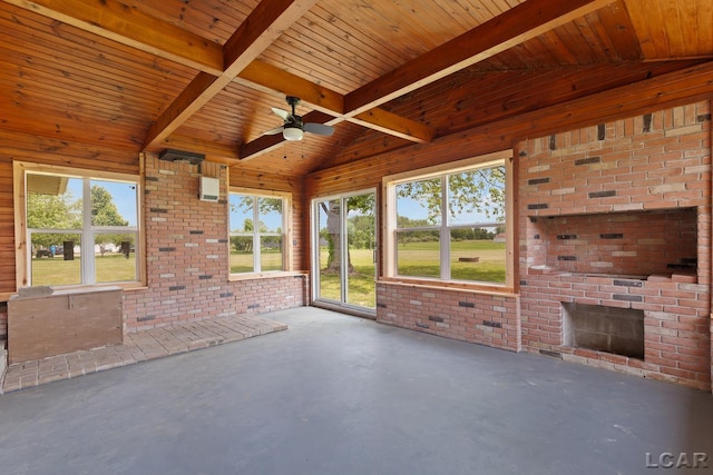 6027 Onsted Hwy, Onsted, MI 49265 - unfurnished living room featuring an outdoor brick fireplace, concrete floors, wood ceiling, and ceiling fan