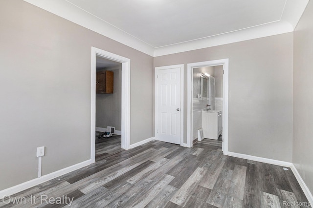 198 Fairmont St, Wyandotte, MI 48218 - unfurnished bedroom featuring wood finished floors and ensuite bath
