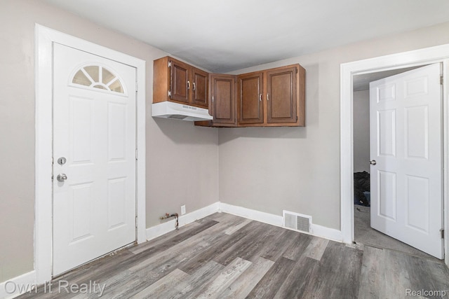 198 Fairmont St, Wyandotte, MI 48218 - washroom with dark wood-type flooring and baseboards