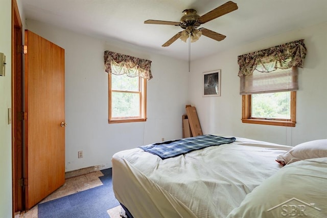 2190 S Coleman Rd, Shepherd, MI 48883 - bedroom with carpet floors and ceiling fan