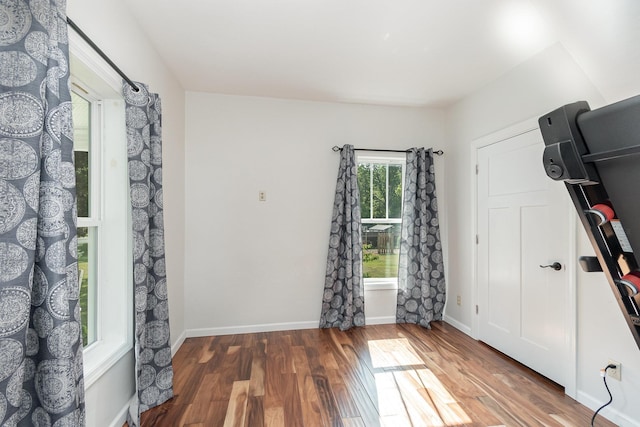 8015 Bloomer St, Carson City, MI 48811 - exercise room with wood finished floors and baseboards