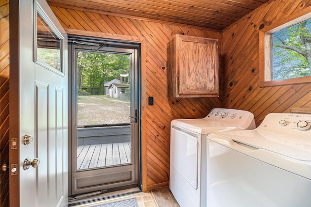 6253 Loggers Ln, Ludington, MI 49431 - washroom featuring independent washer and dryer, wooden walls, and wooden ceiling