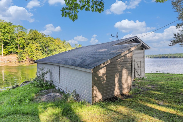 6253 Loggers Ln, Ludington, MI 49431 - view of outbuilding featuring a water view